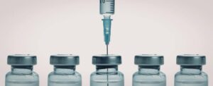 frasco medicamento com seringa